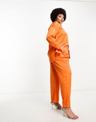 Vero Moda Curve satin wide leg trousers in bright orange