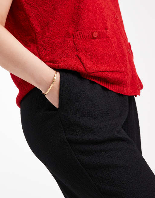 Vero Moda Curve – Svarta, texturerade byxor i jersey med dra på-design, 3 av 5