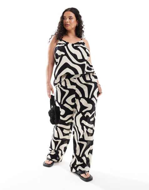 Vero Moda Curve – Svartvita, vida byxor i linnemix med abstrakt mönster, del av set - view 1