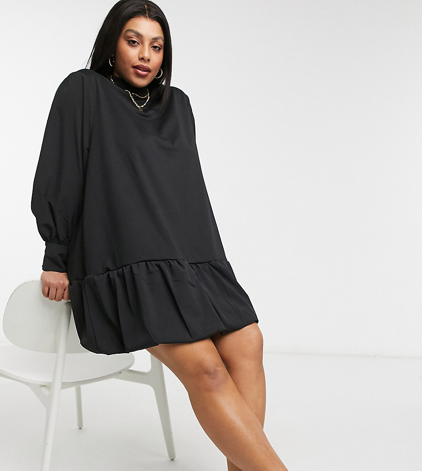 Vero Moda Curve sweatshirt mini dress with peplum hem and volume sleeves in black