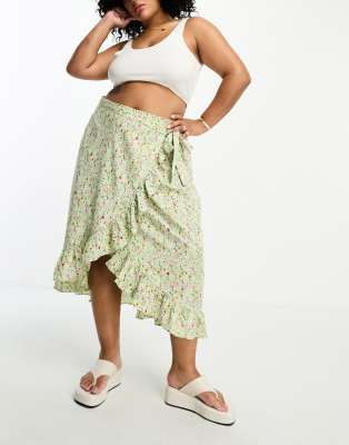 Vero Moda Curve wrap front midi skirt in green florals