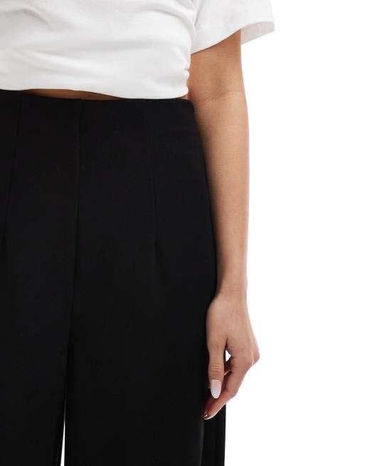 Vero Moda – Czarne spodnie z dżersejowej krepy z bardzo szerokimi nogawkami, 4 z 5