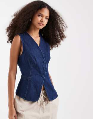 Vero Moda denim asymmetric placket vest with covered buttons in medium blue wash