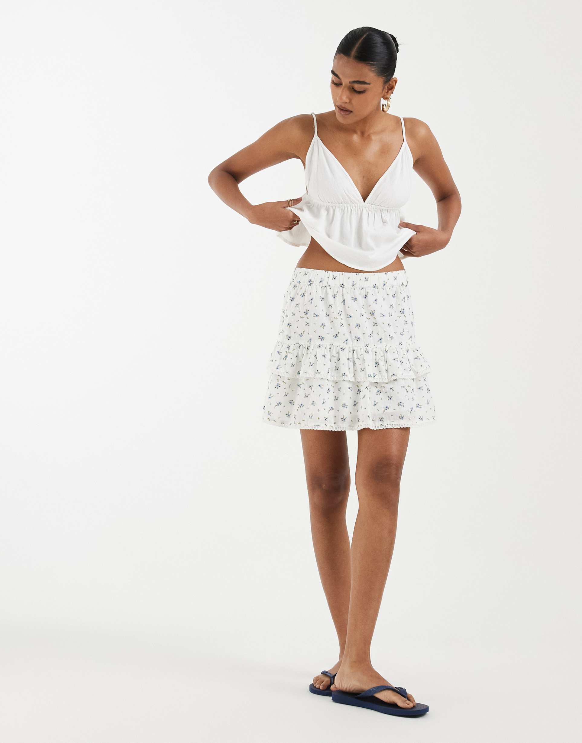 vero moda dobby texture ruffle lace trim mini skirt in white and blue floral print