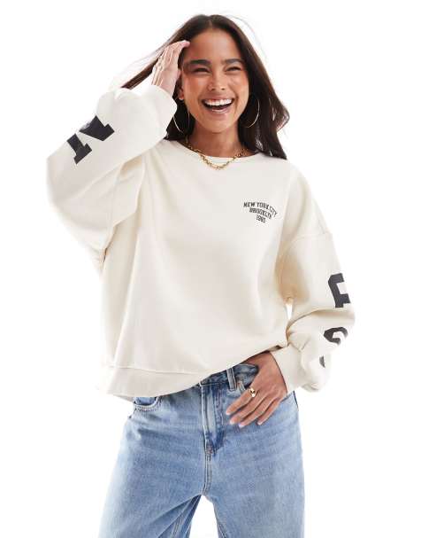 Vero Moda drop shoulder ''new york brooklyn'' sweatshirt in cream - view 1
