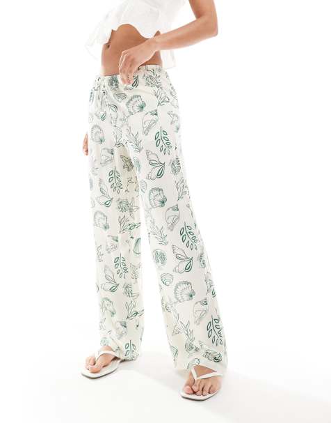 Vero Moda Easy tie waist wide leg trousers in conversational sea print - view 1