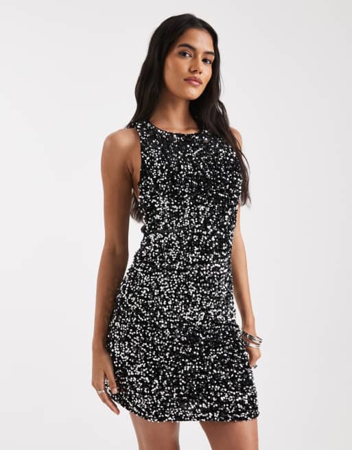 Vero Moda – Fakturowana cekinowa sukienka mini w kolorze czarno-srebrnym z kokardą z tyłu