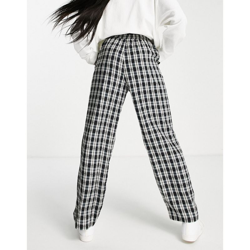 Pantaloni e leggings OtA8X Vero Moda - FRSH - Pantaloni con fondo ampio neri a quadri