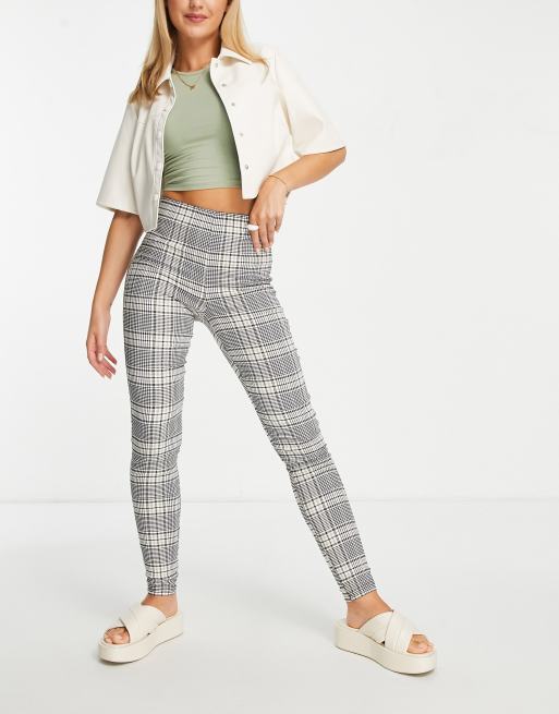 Checkered store tight trousers