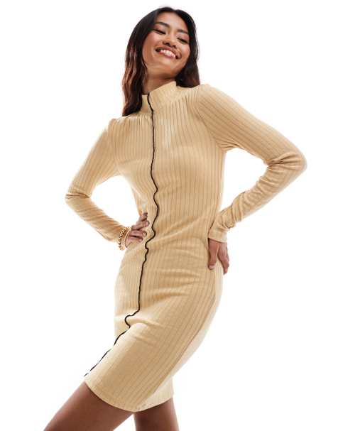 Vero Moda - Geribbelde jersey mini-jurk met golvende rand in beige - view 1