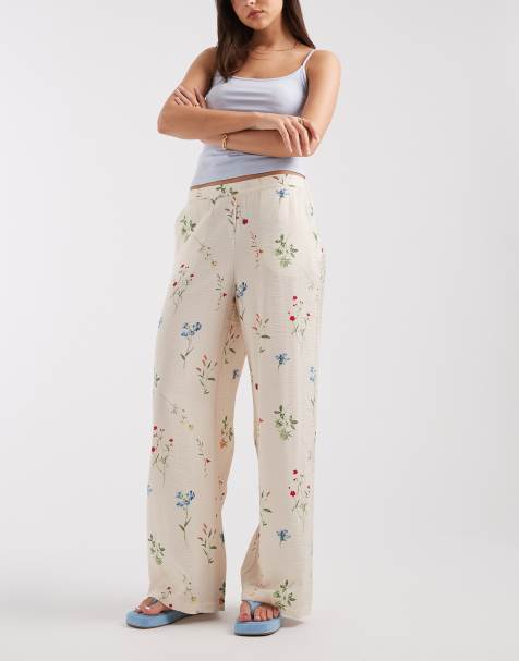 Vero Moda high waist wide leg trousers in cream floral print