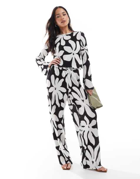 Vero Moda - Højtaljede og plisserede bukser med brede ben og monokromt blomsterprint - Del af sæt - view 1