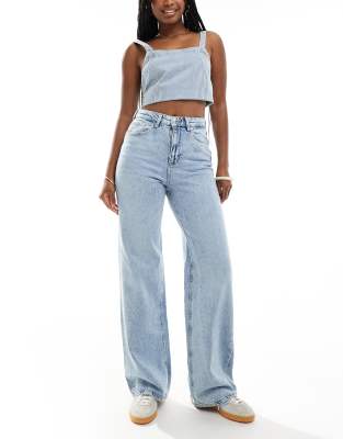 Vero Moda - Jeans in hellblauer Waschung mit hohem Bund und weitem Bein