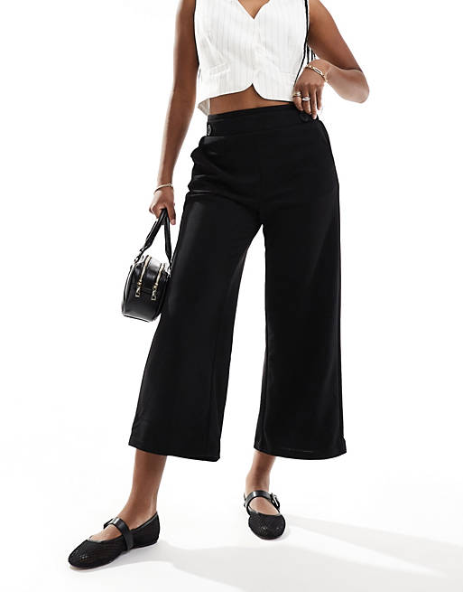 Vero Moda jersey pull on 7/8 pants with button waist detail in black | ASOS