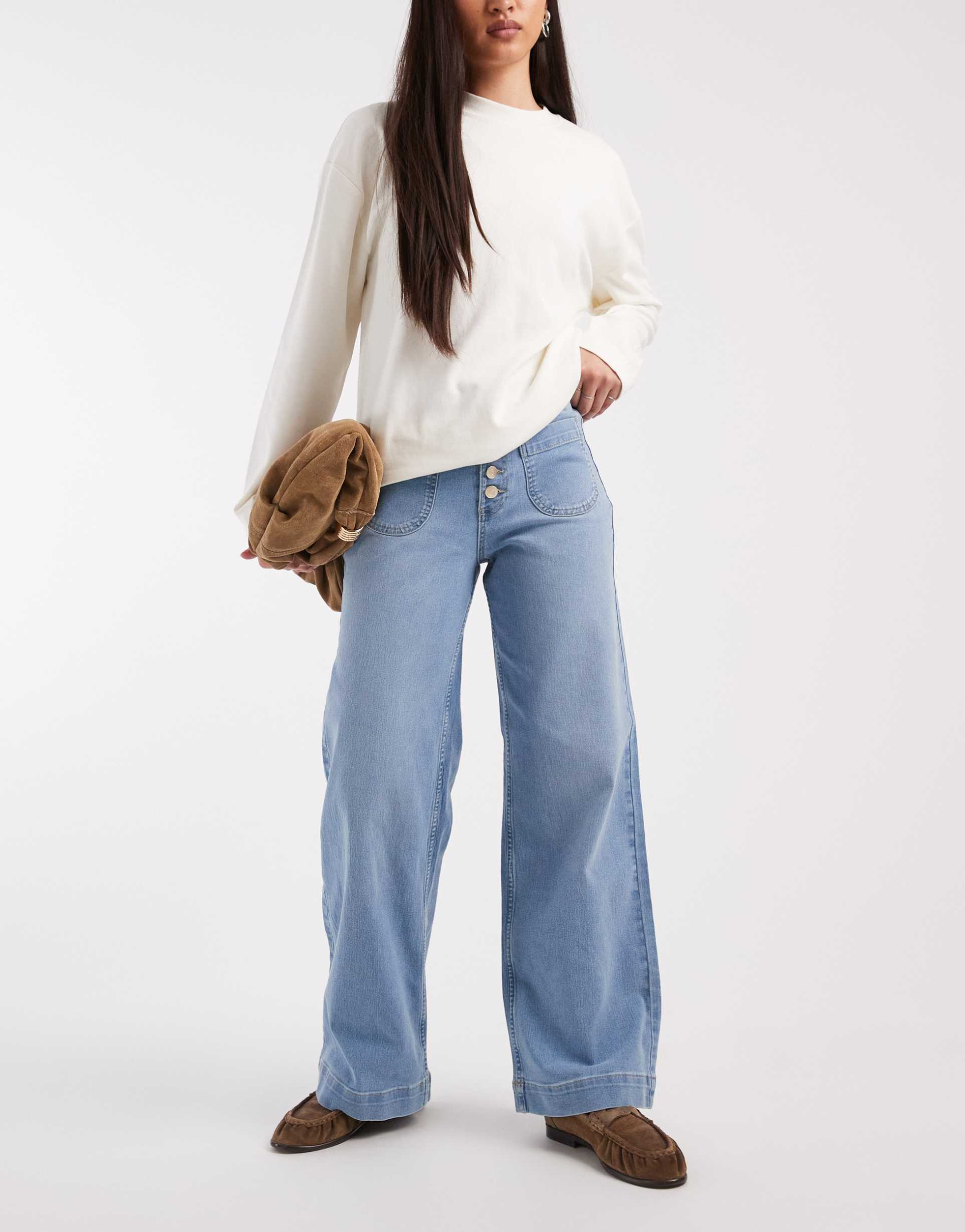 vero moda kayla button front wide leg jeans in light blue denim