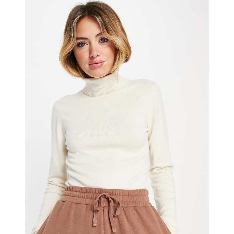 Cream knitted clearance roll neck jumper