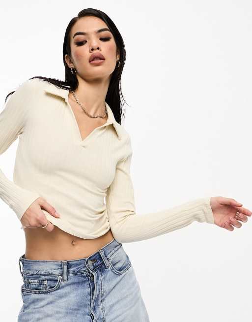 Vero Moda – Krämvit stickad pikétröja