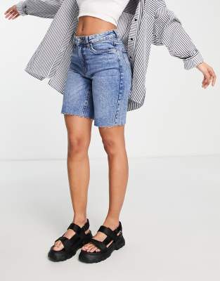 Vero Moda longline denim shorts with raw hem in light blue