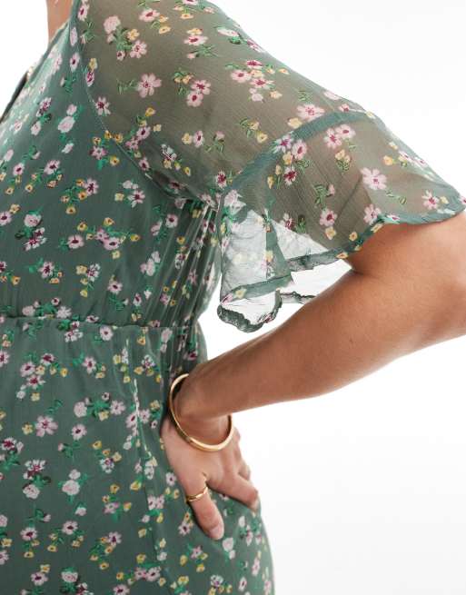 Vero Moda Maternity flutter sleeve v neck mini dress in sage green floral |  ASOS