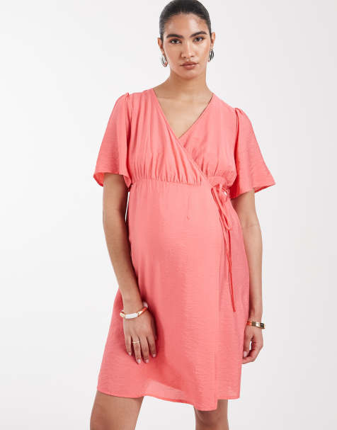 Vero Moda Maternity flutter sleeve wrap front mini dress in coral pink