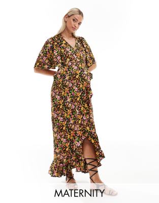 Vero Moda Maternity - Umstands-Maxikleid mit Wickeloptik vorn und dunklem Blumenmuster-Bunt