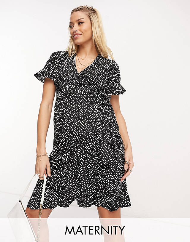Vero Moda Maternity wrap mini dress in black spot print