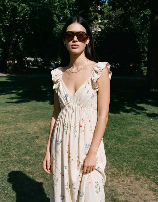 Vero Moda - Maxi jurk met ruches, V-hals en bloemenprint in crème, 2 van 3