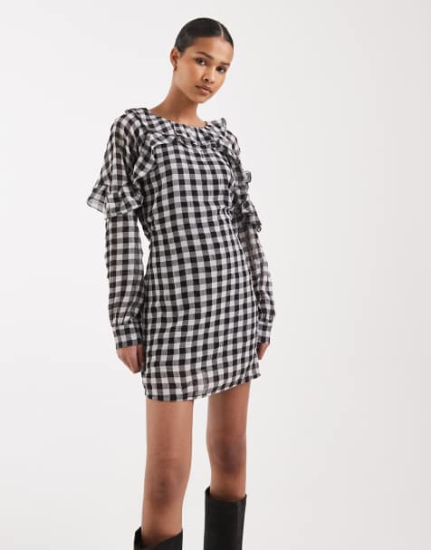 Vero Moda - Mini jurk met ruches, lange mouwen en gingham ruit in zwart en wit - view 1