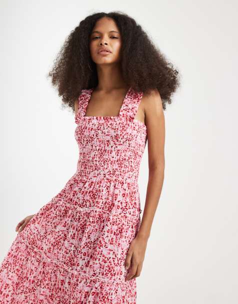 Vero Moda - Mouwloze midi jurk met gesmokt lijfje en stroken in roze bloemenprint - view 1