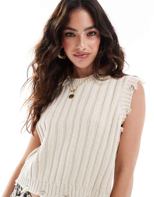 Vero Moda - Mouwloze opengewerkte gebreide top in crème
