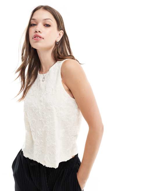 Vero Moda - Mouwloze top met bloemapplicaties in wit