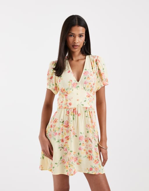 Vero Moda - Nette mini jurk met knopen aan de voorkant en bloemenprint in geel, 3 van 4