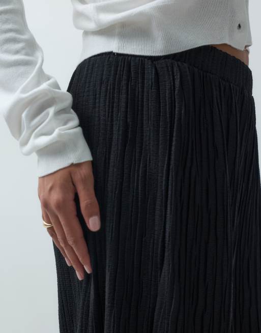 Vero Moda pantalones de pernera ancha plisados en negro, 4 de 5