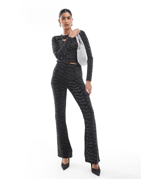 Vero Moda - Pantaloni a zampa neri e argento glitterati in coordinato - view 1