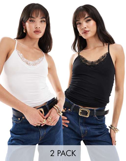 Vero Moda Petite - Confezione da 2 canotte con dettaglio in pizzo in nero e bianco