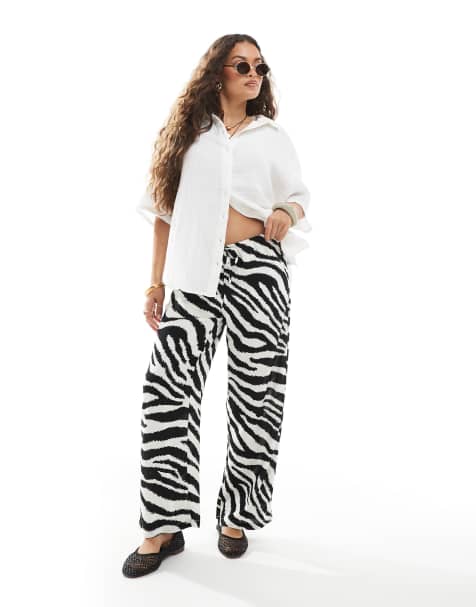 Vero Moda Petite Easy tie waist wide leg trousers in zebra print - view 1