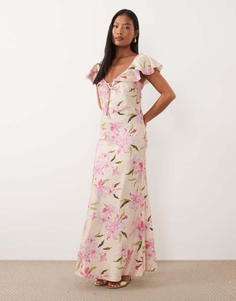 Vero Moda Petite flutter sleeve satin maxi dress in cream based pink floral print