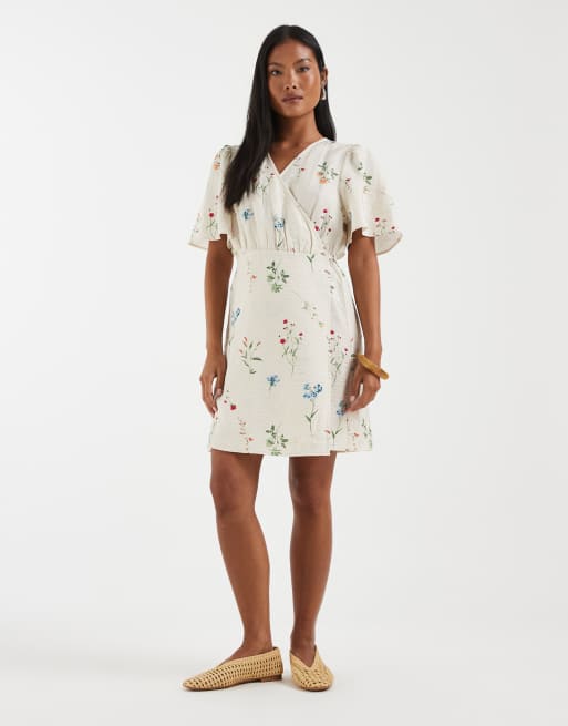 Vero Moda Petite flutter sleeve wrap front mini dress in cream floral print, 2 of 4