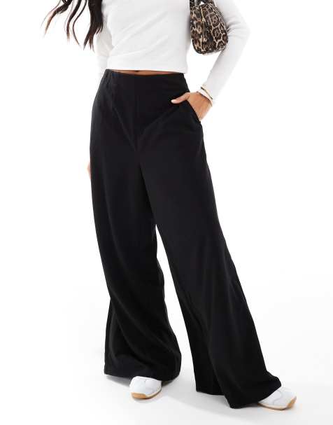 Vero Moda Petite jersey crepe super wide leg trousers in black