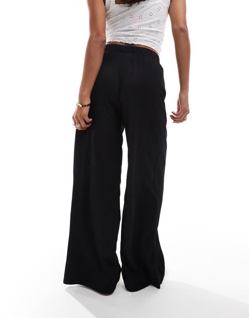 Vero Moda Petite - Pantaloni a fondo ampio neri in jersey crêpe, 3 di 5