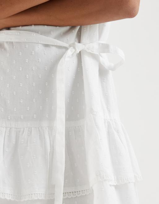 Vero Moda Petite - Robe courte en popeline à volants avec bords en dentelle et liens à la taille - Blanc, 3 de 4