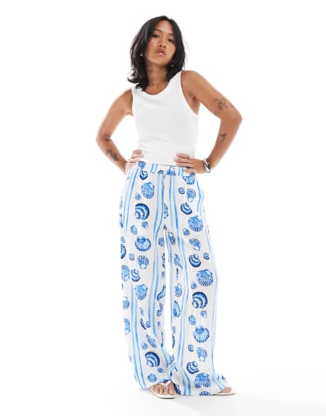 Vero Moda Petite straight leg trousers in blue seashell print