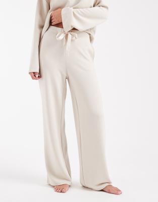 Vero Moda Petite Vero Moda Petite super soft tie waist wide leg jogger co-ord in cream-White