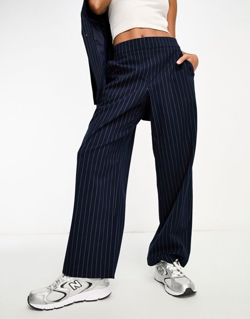 Vero Moda Petite VMGOLDNEEDLE CHECK SOLID TROUSE - Trousers