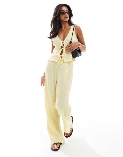 Vero Moda Petite textured jersey tie-front top and wide leg pants set in pale lemon