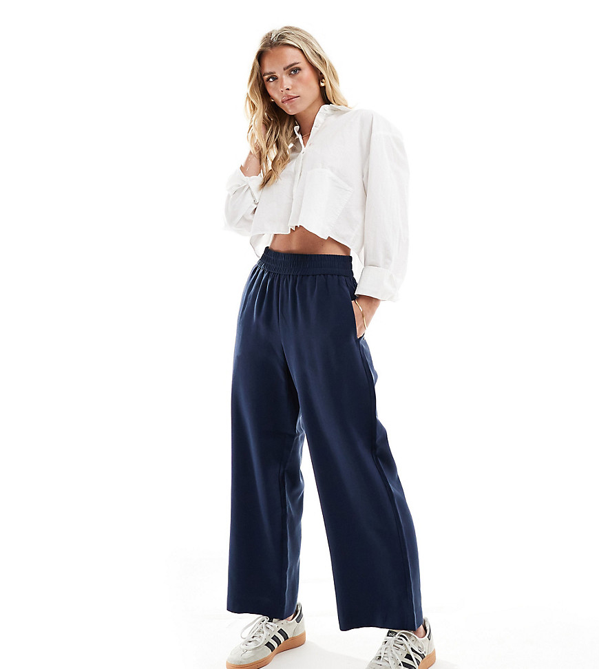 Vero Moda Petite wide leg pull on trousers with elasticated waist in navy