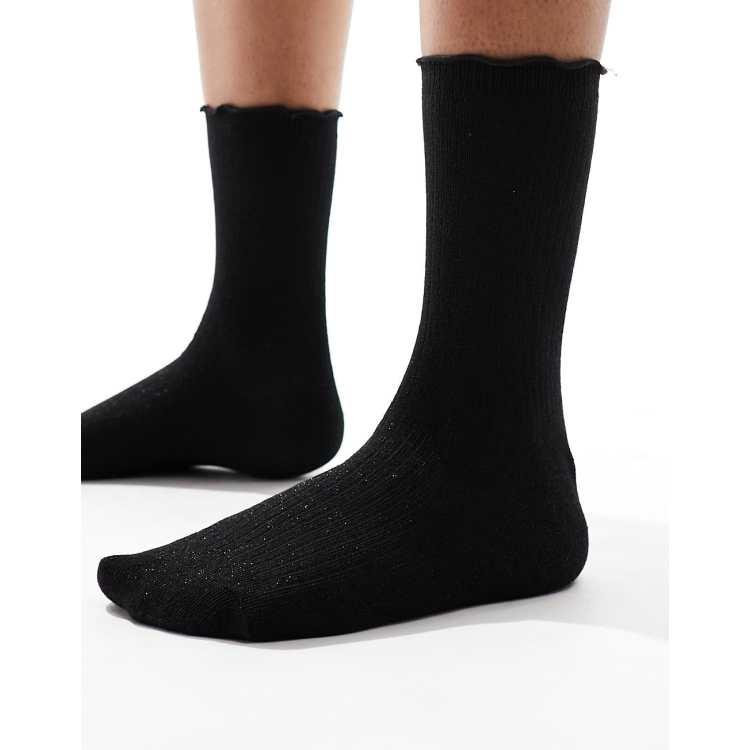Vero Moda ribbed glitter sock with frill edge in black | ASOS