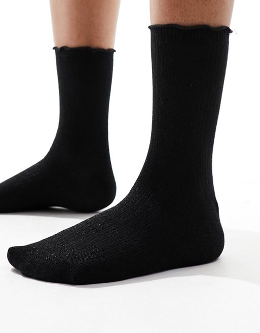 Vero Moda ribbed glitter socks with frill edge in black | ASOS