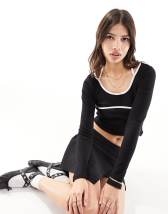 Edikted Yara ribbed ruffle hem top
