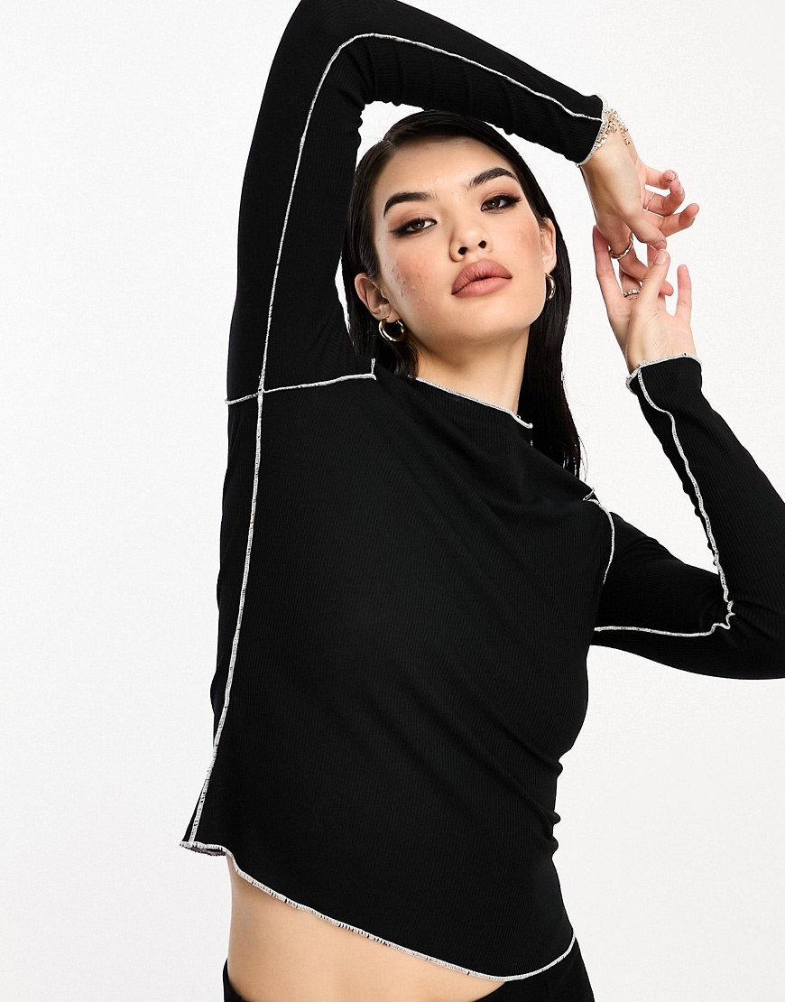 Vero Moda ribbed long sleeve top in black with contrast seam detail